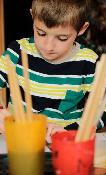 istock Children painting at home, making crafts. 1474576718