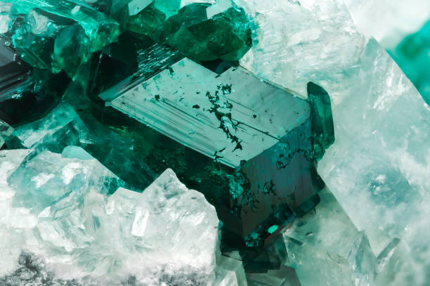 istock Dioptase crystal on white calcite 1474577669