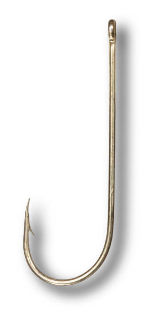 istock Shadow behing a brass colored fishing hook with a barb 1474577767