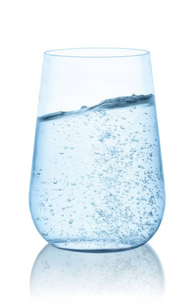 istock water with wave surface level in glass isolated on white 1474579008