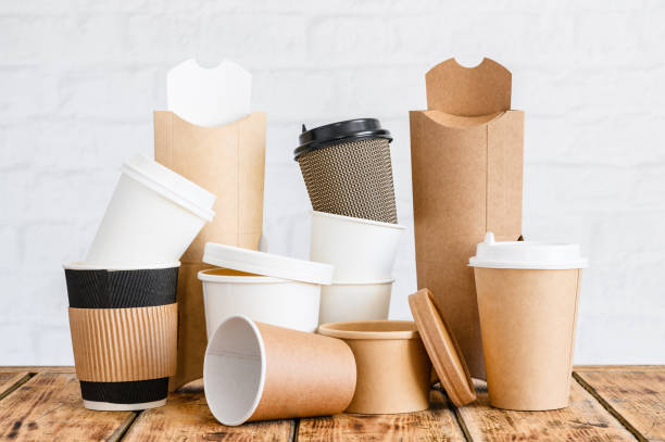 istock The concept of life with zero waste. A set of disposable eco-friendly tableware and packaging made of cardboard and paper. 1474583684