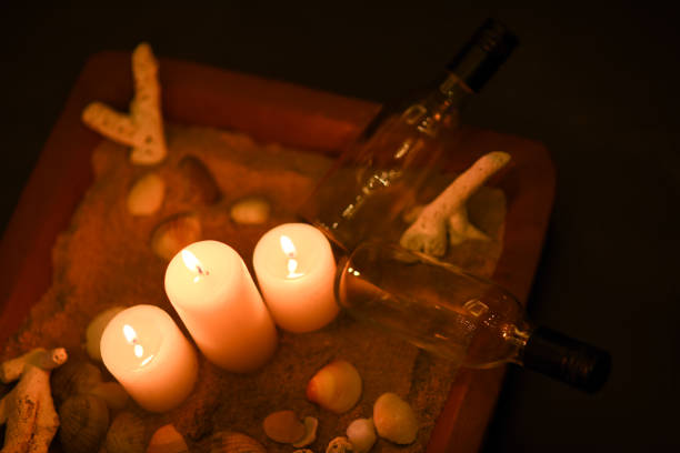 A beautiful Close up of Candle lights deco with bokeh lights on a table