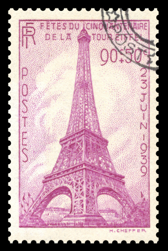 Vintage 1939, France postage stamp showing an engraved image of the Eiffel Tower in Paris, France