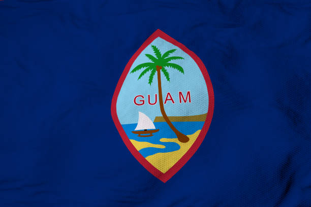Full frame close-up on a waving flag of Guam in 3D rendering.
