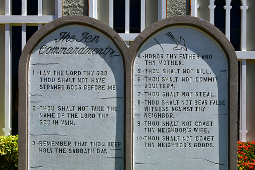 Chalan Kanoa / Charan, Saipan, Commonwealth of the Northern Mariana Islands (CMNI): the Ten Commandments  in two tablets in front of the Catholic Cathedral of Our Lady of Mount Carmel Cathedral. You shall have no other God's before me. Thou shalt not make unto thee any graven images. Thou shalt not take the name of the Lord thy God in vain. Remember the Sabbath day and keep it Holy. Honour your father and mother. Thou shalt not kill. Thou shalt not commit adultery. Thou shalt not steal. Thou shall not bear false witness. You shall not covet.