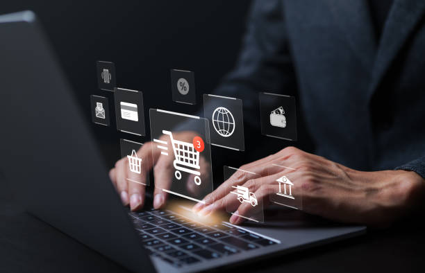 istock Businessman using laptop computer to input order with icons shopping trolley, credit card, delivery truck, bank, shopping basket, wallet for online shopping and e-commerce technology concept. 1474595782