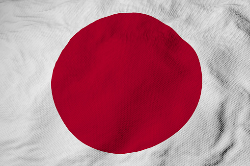 Full frame close-up on a waving flag of Japan in 3D rendering.