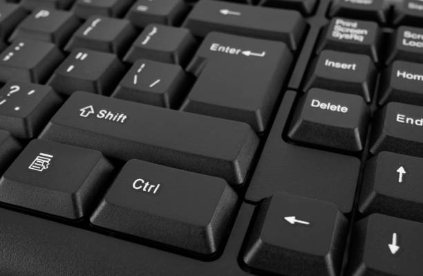 istock Part of a computer keyboard, black close-up 1474597330