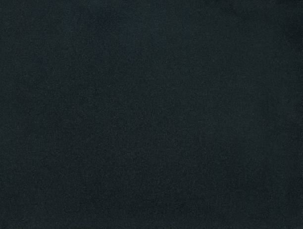 istock Dark black background with noise speckles 1474600187