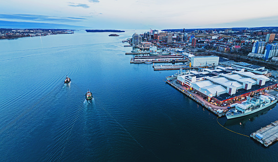 Aerial view of a pair of tugboats in Halifax Harbour.