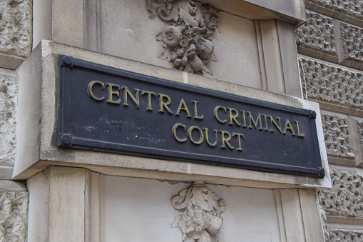 London, UK - September 30 2021: Detail of the sign at the Central Criminal Court, known as Old Bailey.