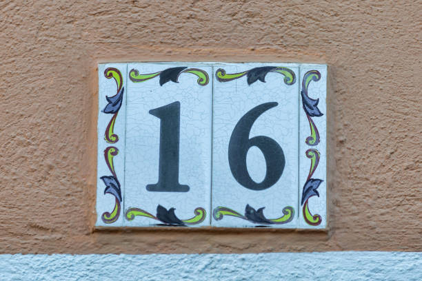 istock Old Weathered House Number 16, Tile on Wall 1474609079