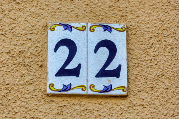 istock Old Weathered House Number 22, Tile on Wall 1474609089
