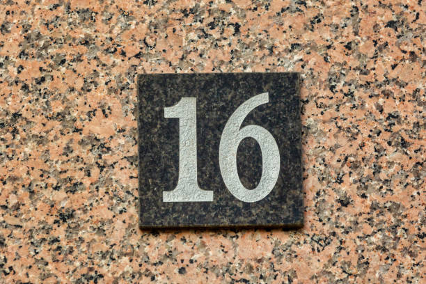 istock Old Weathered House Number 16, Tile on Wall 1474609396