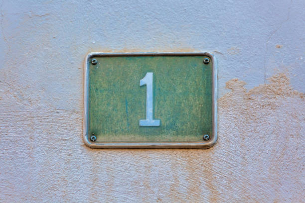 istock Old Weathered House Number 1, Tile on Wall 1474609630