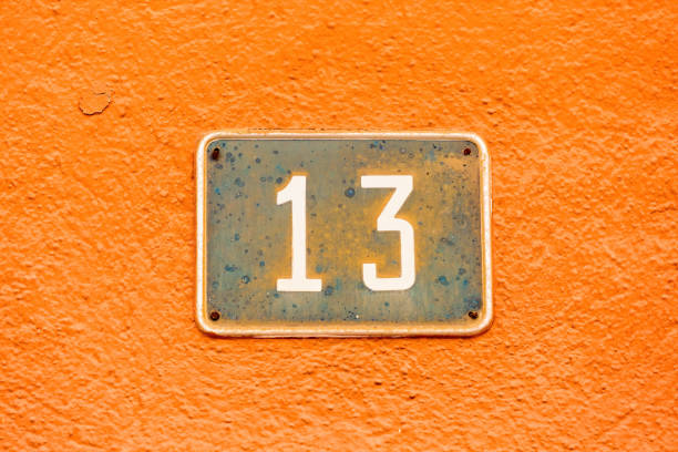 istock Old Weathered House Number 13, Tile on Wall 1474610162