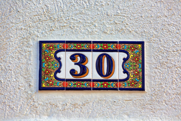 istock Old Weathered House Number 30, Tile on Wall 1474610191