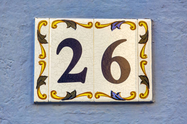 istock Old Weathered House Number 26, Tile on Wall 1474610195