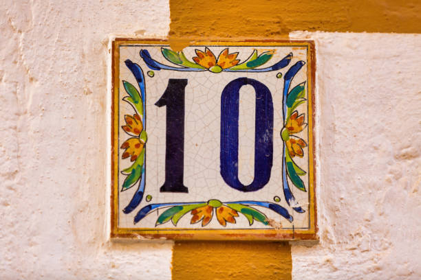istock Old Weathered House Number 10, Tile on Wall 1474610244