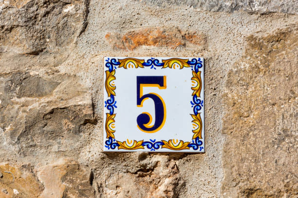istock Old Weathered House Number 5, Tile on Wall 1474610245