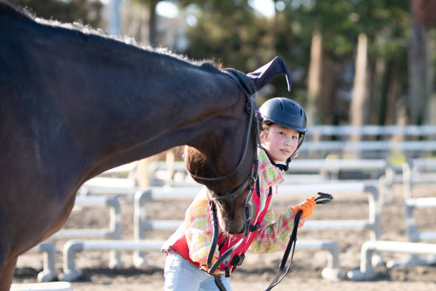 istock Girl practicing horse riding 1474610265