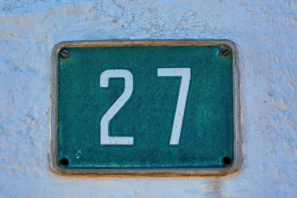 istock Old Weathered House Number 27, Tile on Wall 1474610310