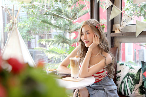 istock Girl in Cafe 1474612293