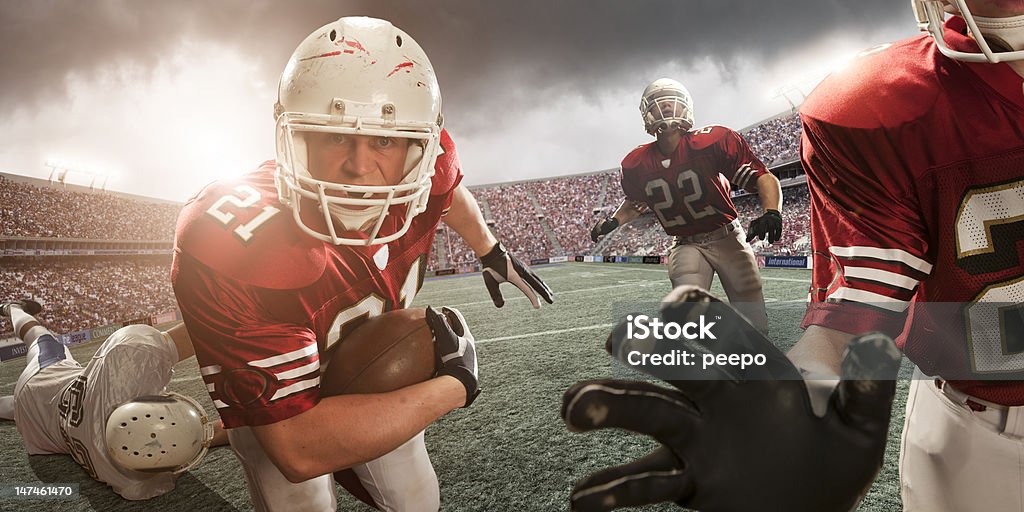 Azione di Football americano - Foto stock royalty-free di Football americano