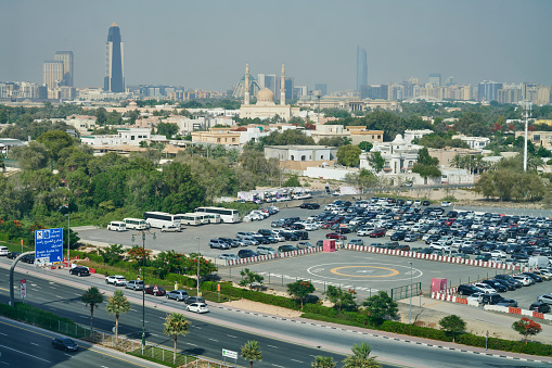 Dubai, United Arab Emirates - May 31, 2022: a public parking and helicopter landing pad along UAE Al Mustaqbal Street.