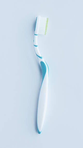 istock Blueish white toothbrush isolated on white. 1474622967