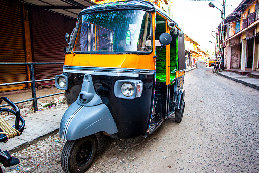 Traditional indian transportation - motor rikshaw on the streetsd of Fort Kochin, Kerala, India