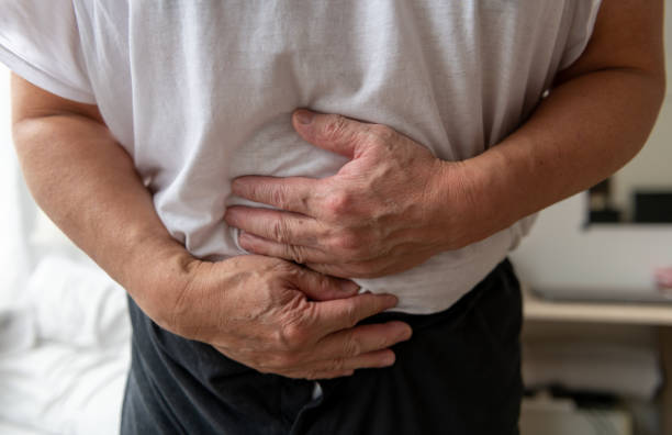 istock A person suffering stomach pain. 1474626269