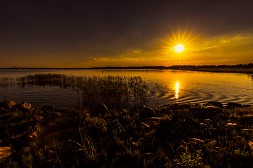 Sunset over the lake. Picturesque landscapes. Beautiful view. Polish landscape. Nature background.