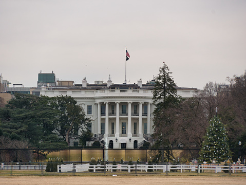 Arlington County, United States – November 10, 2021: a closeup of The Tomb of the Unknown Soldier surrounded by flowers in Vietnam