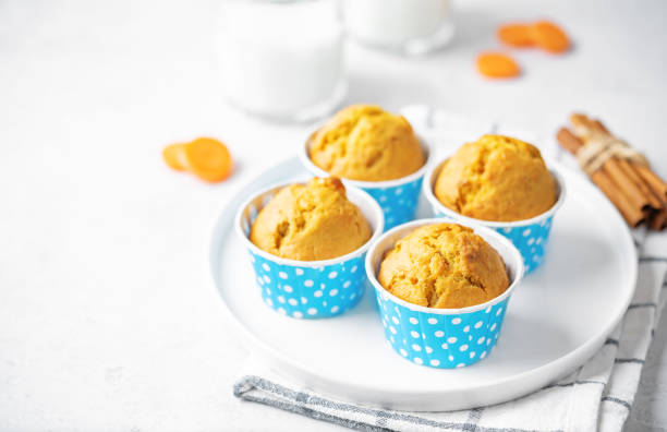 istock Carrot muffins with drink 1474630424