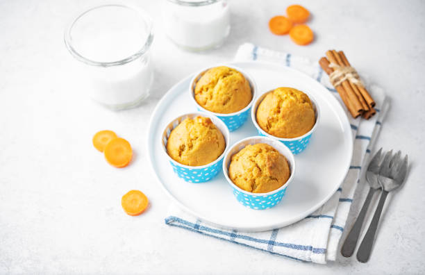 istock Carrot muffins with drink 1474630425