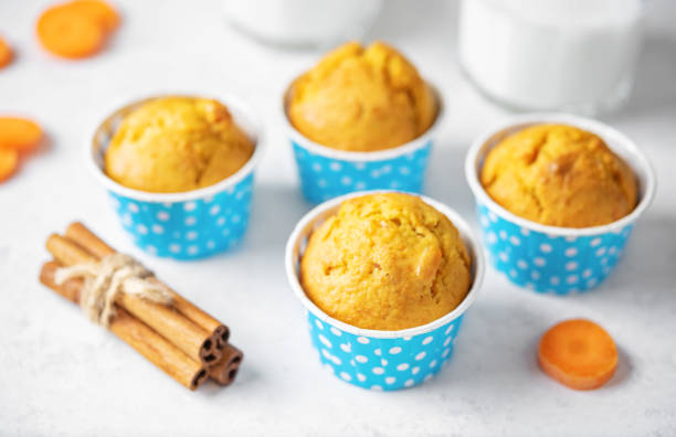 istock Carrot muffins with drink 1474630426