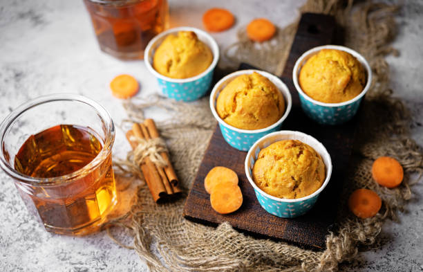 istock Carrot muffins with drink 1474630433