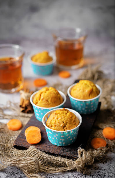 istock Carrot muffins with drink 1474630434
