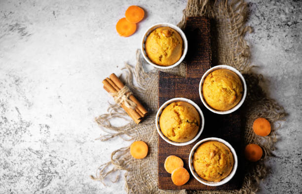 istock Carrot muffins with drink 1474630435