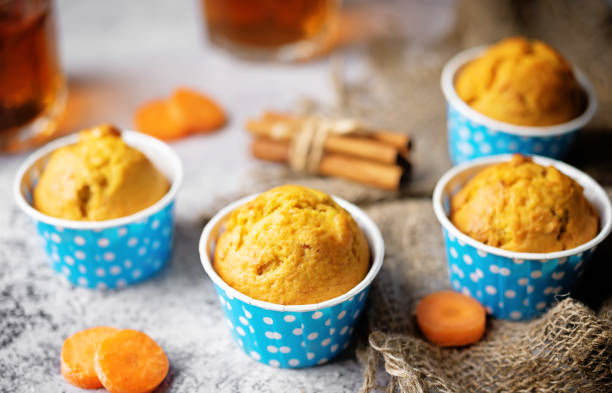 istock Carrot muffins with drink 1474630436