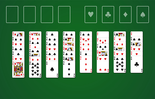 Freecell solitaire card game on green background with standard playing cards