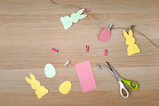 istock Creating decorative garland for Easter. Flat lay. Crafts for children and adults. 1474643200