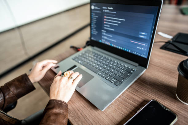 istock Close-up of a woman using laptop 1474648852