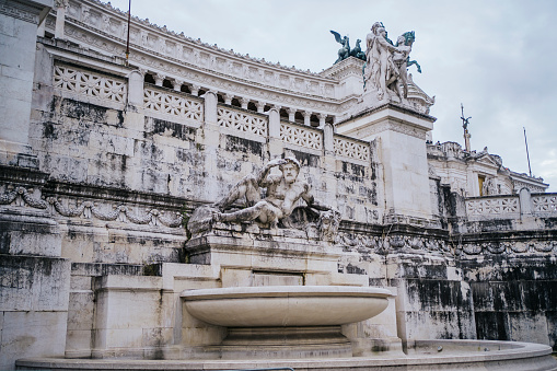 Fountain with a marble statue of the National Monument to Victor Emmanuel II also known as Altare Della Patria in Rome, Italy