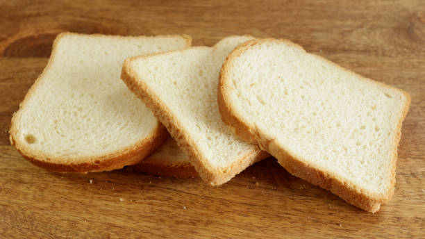 istock slices of white bread, close-up, on a table 1474655992