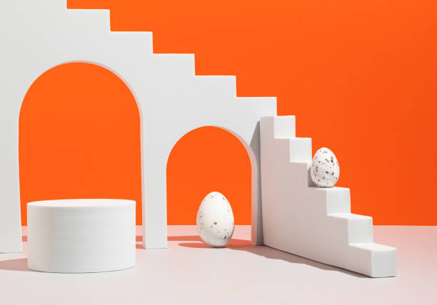istock Podium, stand for product presentation and Easter eggs on orange background. Mockup for branding and festive packaging presentation. Modern aesthetic. 1474656200