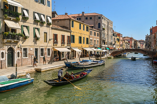 Venice, Veneto, Italy - 08 26 2022: The Rio della Misericordia canal is located in the sestiere (\