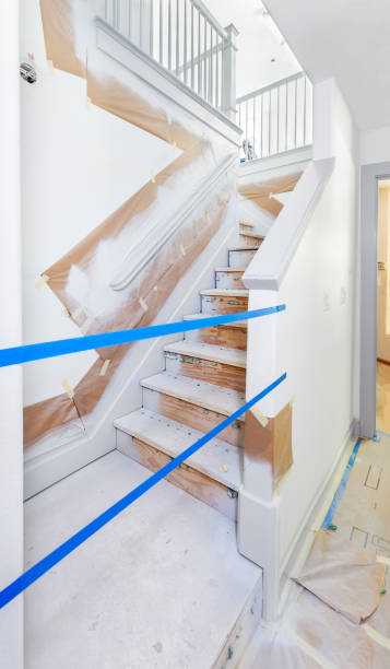 istock Painting trim on stairs 1474669650