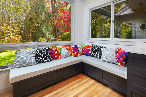 Sunny fall view from remodeled kitchen window bench seats